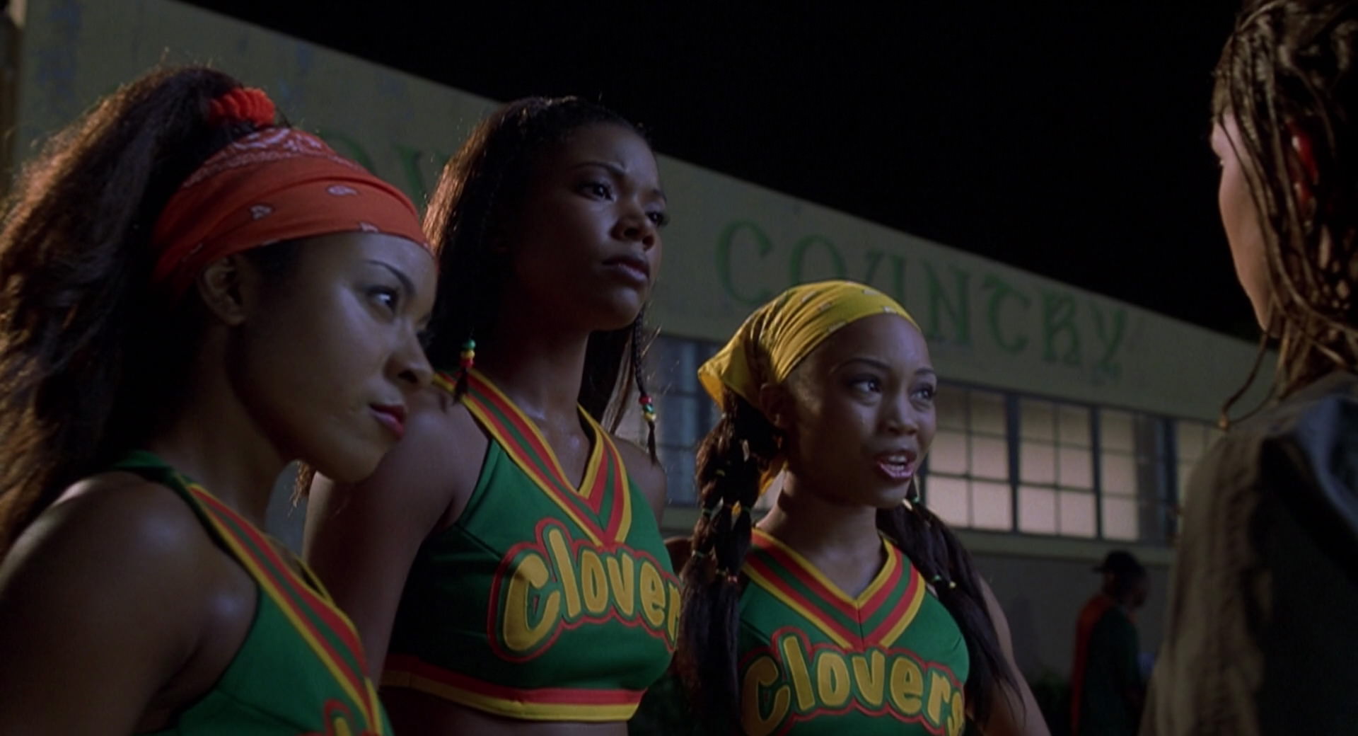 Members of the Compton Clovers cheer squad confront the Rancho Carne Toros about stealing their dance moves in a now iconic scene from "Bring It On."