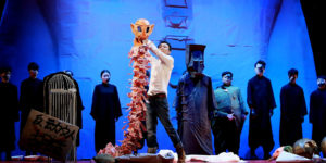 Actors from the National Theatre Company of China perform ‘Mr. Big’ in Beijing, March 31, 2016. Visual elements symbolic of the Cultural Revolution are seen on the stage. Courtesy of Culture Wuzhen Co., Ltd. Originally published by Sixth Tone