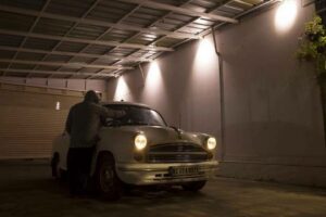 The Ambassador car in a garage for the performance "Bhranthu"