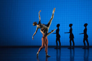 A pair of dancers in a promo image from "rEVOLTION" by Boston Ballet