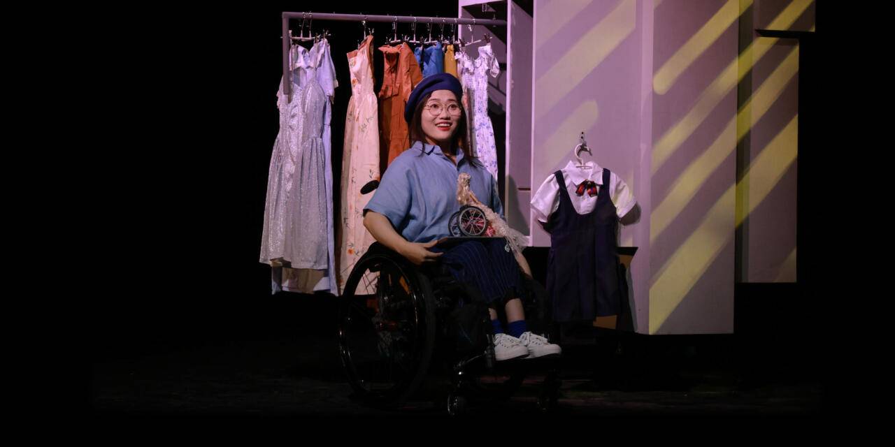 On Stage And In A Wheelchair